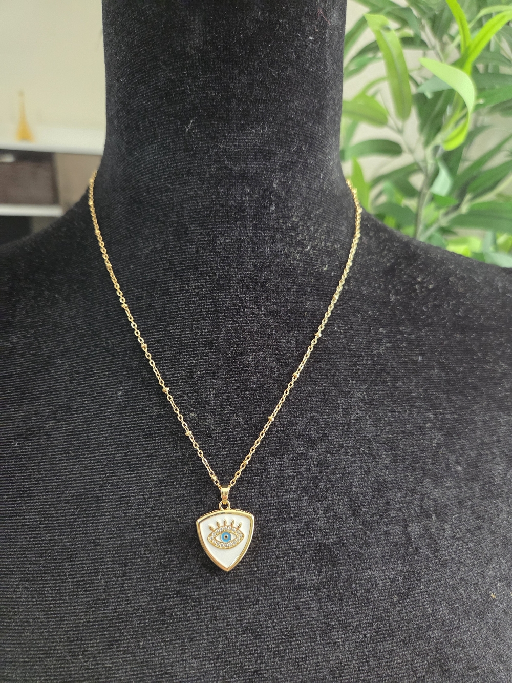 Gold-tone Evil Eye Pendant Necklace with White Enamel